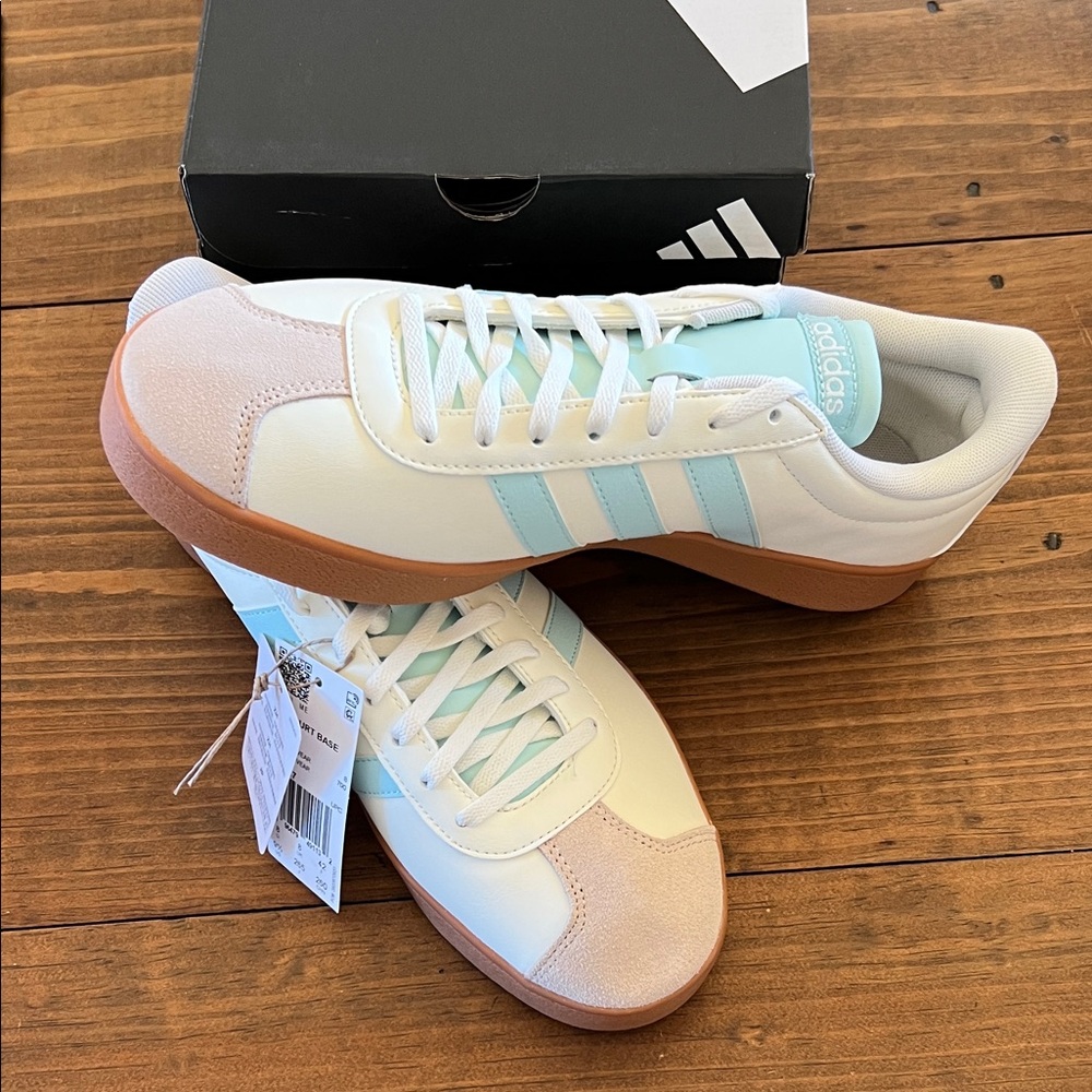 Women’s 9.5 Adidas Cream and Light Blue Sneakers